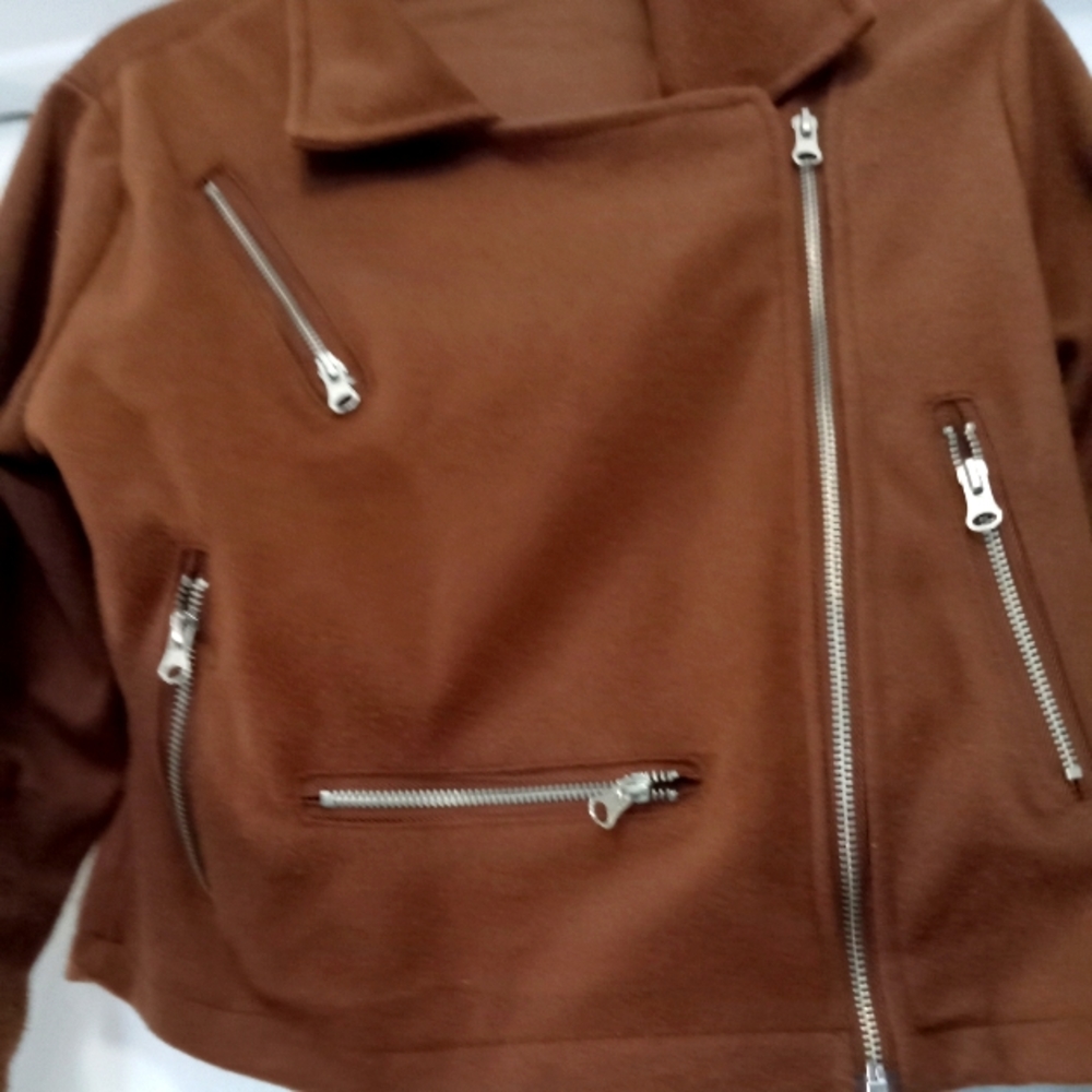 Ladies brown bikers jacket. awesome with jeans size large.
